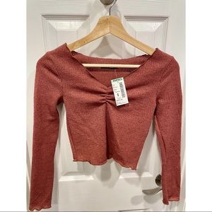 Cropped long sleeve top